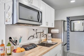 Fridge, microwave, dishwasher, coffee/tea maker