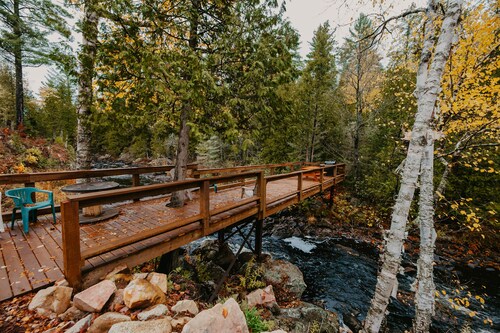 ATV-Snowmobile Trail, Large home, sits on the peshekee river. sleeps 22 people.