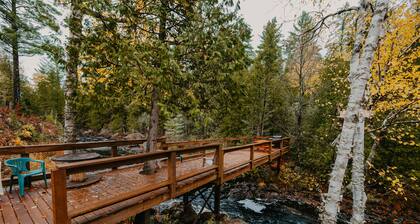 ATV-Snowmobile Trail, Large home, sits on the peshekee river. sleeps 22 people.