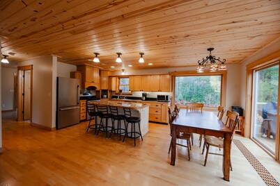 ATV-Snowmobile Trail, Large home, sits on the peshekee river. sleeps 22 people.