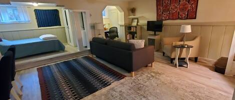 1 bedroom, desk, iron/ironing board, travel crib