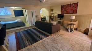 1 bedroom, desk, iron/ironing board, travel crib