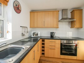 Fridge, electric kettle, toaster, cookware/dishes/utensils