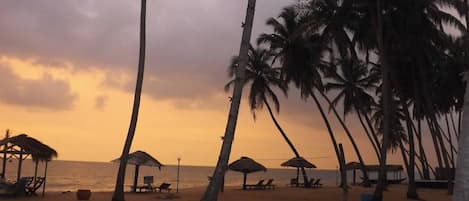 Private beach, white sand, sun loungers, beach towels