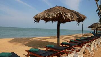 Private beach, white sand, sun loungers, beach towels