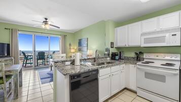 Coffee/tea maker, fridge, microwave, oven