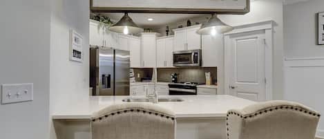 Fridge, microwave, dishwasher, coffee/tea maker