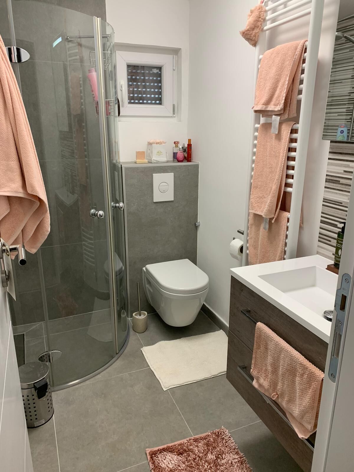 Shower, hair dryer, slippers, towels