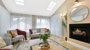 Smart TV, fireplace, books