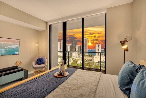 1 bedroom, desk, iron/ironing board, travel crib