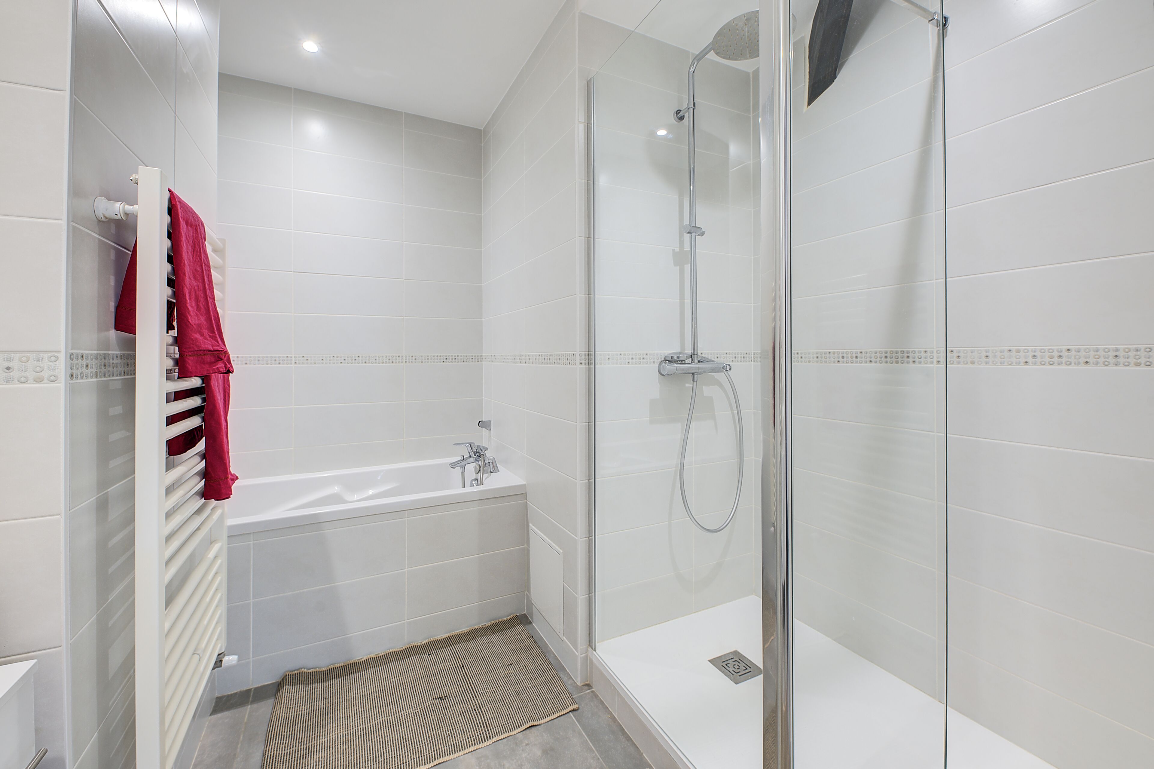 Shower, hair dryer, towels, toilet paper