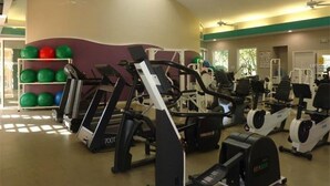 A gym with treadmills, elliptical machines, and exercise balls. - The CHART ROOM -with off the chart views!! (Burnt Store Marina)