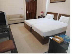 Habitación doble estándar | 1 habitación, tabla de planchar con plancha, wifi gratis y ropa de cama 