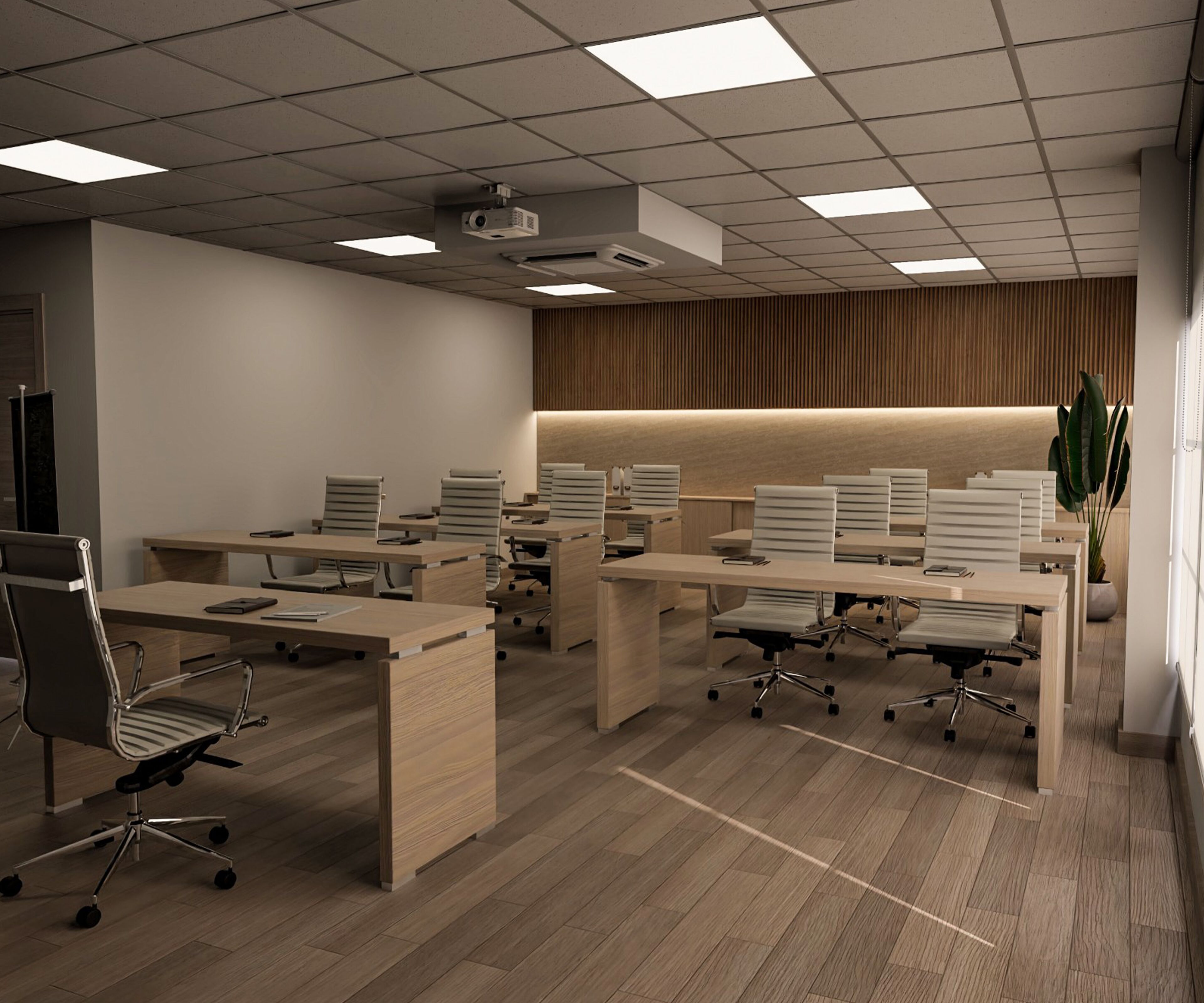 A modern office space with multiple desks and chairs, a projector on the ceiling, and a wooden panel wall.