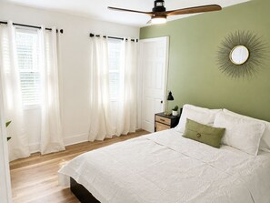 1 bedroom, desk, iron/ironing board, travel crib