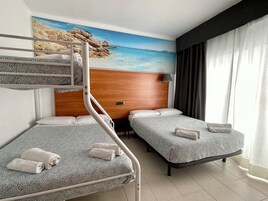 Habitación familiar | Edredones de plumas y colchones viscoelásticos