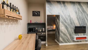 Apartamento família | Opções para refeição no quarto