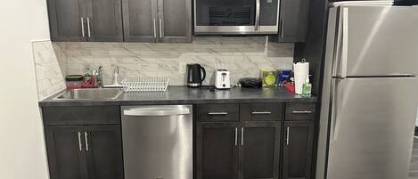 Fridge, microwave, dishwasher, coffee/tea maker