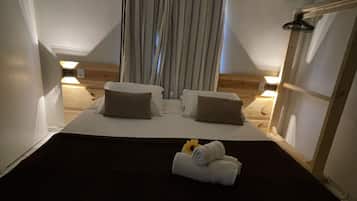 Minibar, muebles diferentes, wifi gratis y ropa de cama