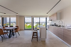 Fridge, microwave, stovetop, coffee/tea maker