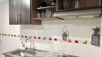 Apartment | Private kitchen | Fridge, blender, griddle, cookware/dishes/utensils