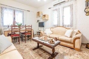 Ferienhaus | Wohnbereich | Kamin