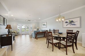 Enjoy meals in this elegant dining area with a round table and six comfortable chairs.