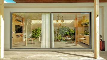 Luxury Villa, 1 Bedroom, Non Smoking, Pool View | Living area | 55-inch LED TV with digital channels, TV, Netflix