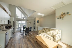 Luxury Townhome, Hot Tub, Mountain View | Living area | 60-inch Smart TV with cable channels, TV, fireplace - Skyline-Townhouse Combo-AC-Pool-Hot Tub (Canmore)