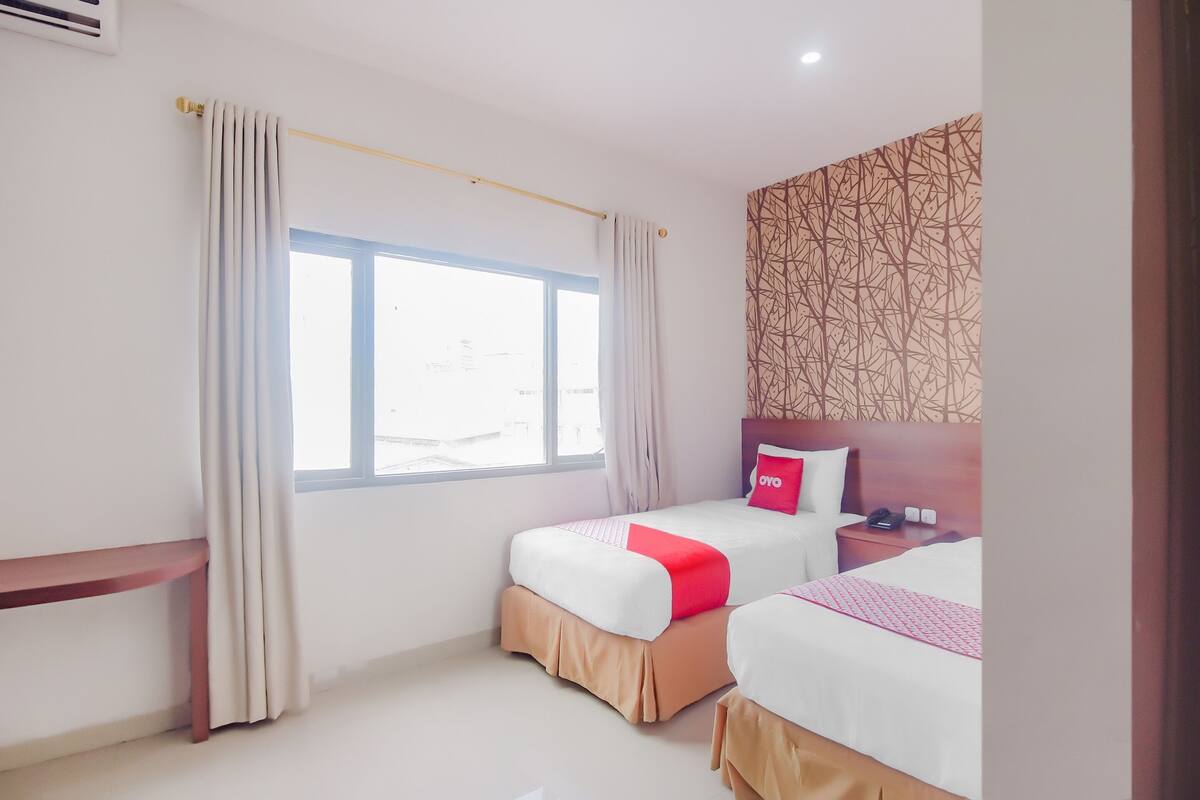 Chambre Deluxe avec lits jumeaux | Wi-Fi gratuit, draps fournis