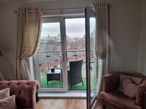 Apartamento, 2 camas Queen | Área de estar