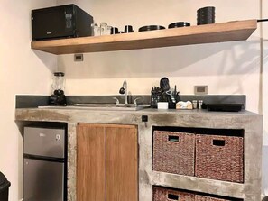 Fridge, microwave, stovetop, coffee/tea maker