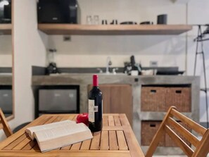 Fridge, microwave, stovetop, coffee/tea maker