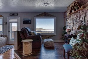 Signature Cabin, 2 Bedrooms, Balcony, Mountain View | Living room | 48-inch Smart TV with cable channels, TV, fireplace - 2 Master Suites _ Phenomenal Views - Alpine Summit (Gatlinburg)