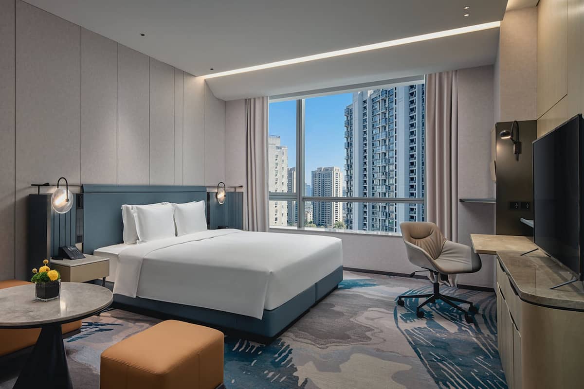 Desk, laptop workspace, free WiFi, bed sheets