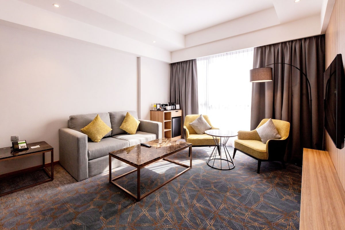 Suite, 1 slaapkamer, toegang tot de clublounge | Kamervoorziening