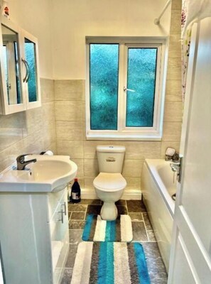 Hair dryer, towels, soap, shampoo