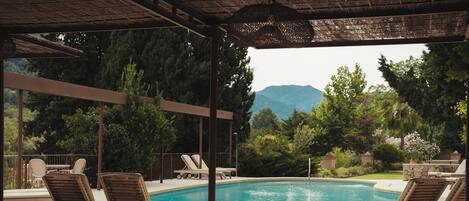 Outdoor pool, pool umbrellas, pool loungers