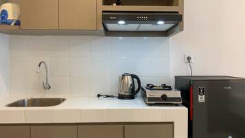 Apartemen Deluks | Dapur pribadi | Lemari es besar dan kompor