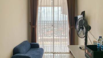 Deluxe appartement, 1 slaapkamer | Woonkamer