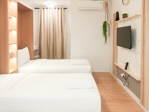 Individually decorated, individually furnished, free WiFi - Elegant And Cozy Studio Barsa City Apartment (Depok)
