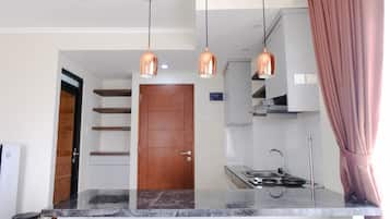 Deluxe Apartment, 3 Bedrooms | Private kitchen | Full-size fridge, stovetop