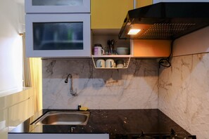 Deluxe Apartment, 2 Bedrooms | Private kitchen | Full-size fridge, stovetop - Good Choice 2Br At 12Th Floor Gateway Ahmad Yani Cicadas Apartment (Bandung)