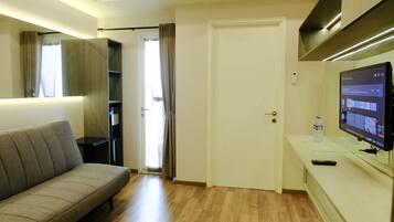 Appartement Deluxe, 1 chambre | Coin séjour