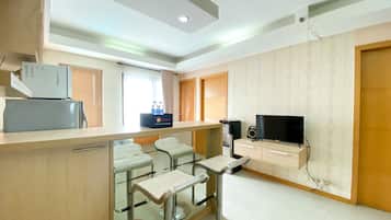 Apartamento Deluxe, 2 habitaciones | Zona de estar