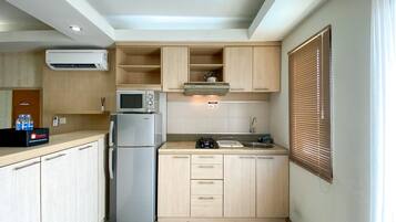 Apartamento Deluxe, 2 habitaciones | Cocina privada | Frigorífico grande y placa de cocina