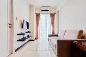 Deluxe-Apartment, 1 Schlafzimmer | Wohnbereich