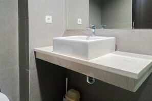 Deluxe Studio | Bathroom - Homey Studio At Patraland Amarta Apartment (Ngaglik)