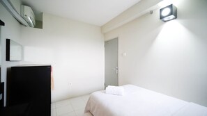 Apartamento Deluxe, 2 habitaciones | 2 dormitorios, decoración individual, mobiliario individual y escritorio