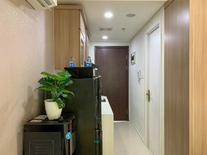 Guest rooms offer a convenient kitchenette with a refrigerator and sink.
